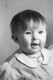 Who are the individuals in these old family photographs?