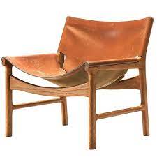 illum wikkelso lounge chair in cognac leather and oak leather side chair leather chair easy chair