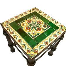 We make this table with 4 copper panels, awesome. Mexican Tile Wrought Iron Table Primavera Mexican Tile Designs