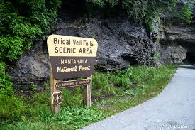 Bridal veil falls is a 120′ tall waterfall that begins with a cascade off an overhang at the top. Bridal Veil Falls Near Highlands North Carolina