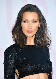 Bella hadid pulled out all the stops for a trip with friends, and that included wearing a particularly risqué a bathing suit while out on a boat. Bella Hadid Looks Incredible With Gray Hair Glamour
