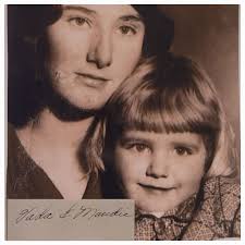 Eastman/Thomas family reunion. Possibly 1952. Pretty sure that is Mary  Alexander in her mother Floy's arms.