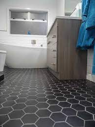 As great as the classic tiny hexagons are, these beefy tiles have a fabulous graphic impact. Black Hexagon Tiles Bathroom Novocom Top