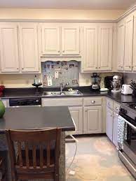 Have a laminate cabinet doors you want to update? Plywood Sub Floor With Semi Transparent Deck Stain And Large Stencil Design Painted With Porch Paint Cabinets Painted Kitchen Decor Home Furnishings Flooring