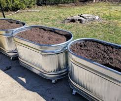 Birdies Raised Garden Beds Instructions How I Made Galvanized Trough Planters Garden Planters Diy Water Trough Galvanized Trough