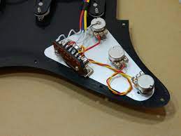 In an ideal situation, electrifying your build is as simple as gluing in a piezo (or mounting in a magnetic pickup), wiring it to a jack, and bingo. Ironstone Guitar Pickup Wiring Electric Guitar Pickups By Ironstone