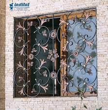 Check spelling or type a new query. For Security That Makes A Stylish Statement Wrought Iron Window Screens Deliver Wrought Iron Window Iron Window Grill Door Design