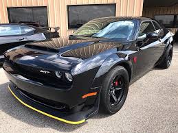 Inside the crate is a programmer that enables the race fuel sensor. Downsizing Hennessey Performance Hpe1200 Dodge Demon