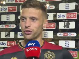 Queens Park Rangers' Sam Field and Steve Cook react to a hard-fought point  and clean sheet against Birmingham