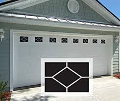 It is a dark grey in color and it is easy to see out but not in. Amazon Com Garage Door Window Covers