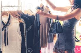 Registration on or use of this site constitutes acc. Beautiful Woman Shopping For Clothes At Retail Apparel Shop In The Shopping Mall Modern Trade Lifestyle Stock Photo Picture And Royalty Free Image Image 127251220