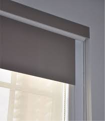 Or choose the pure, simple lines of roller shades, with a versatility that makes them compatible with any room in your home. Side Channels Domir Blinds