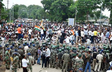 Jharkhand protesters defy barricades, stage sit-in near assembly; cops use force - Rediff.com
