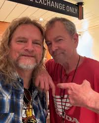 Hangin out .. in the lobby waiting for the hotel room to be ready . Tonight  we play a show in Mashantucket CT. sunglasses a gift from jimmy dean.  @acrossthebreeze thank you