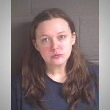 Buncombe County couple charged with abusing adopted child