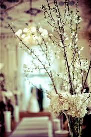 Tall Vase With White Flowering Branches Wedding Table Flowers Winter Wedding Flowers Yellow Wedding Flowers