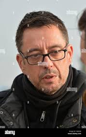 Patrick Visser-Bourdon, the Calais police commissioner in charge of the  operation, speaks to the media close to where demolition workers have  started work