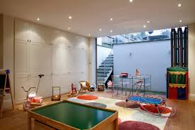 We've already batted around about a dozen different unfinished basement ideas, ways we'd love to remodel the huge blank slate that is our basement. Unfinished Basement Playroom Houzz