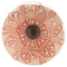 This mermaid has her hands outstretched forward, holding a star. Light Pink Embossed Flower Knob Hobby Lobby 1703339