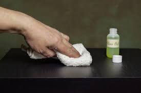 About two years ago i bought a vintage sideboard at an antique shop for only $50. How To Remove Spray Paint From Wood Furniture Without Damaging The Finish Hunker Paint Remover Cleaning Hacks Cleaning Painted Walls