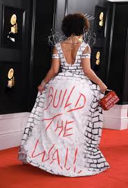 Grammys Pop Star Arrives In Maga Suit Singer Joy Villa Wears Build The Wall Dress Grammy Dresses Dresses Katy Perry Dress