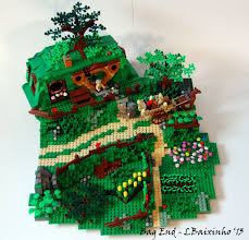Bag End Is Bilbo S Hobbit Hole From The Hobbit And Lord Of The Rings With The Notable Green Door And Immaculate Gard Lego Hobbit Lego Amazing Lego Creations