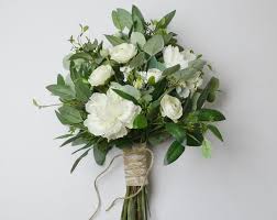 This style prides itself in pairing items with apparently different themes for a cute, curated appeal. Ivory And Eucalyptus Bridal Bouquet Silk Flowers Silver Dollar Eucalyptus With Ivory Garden Roses Peonies Cupped Roses And Ranunculus In 2021 Flower Bouquet Wedding Simple Wedding Bouquets Greenery Bouquet