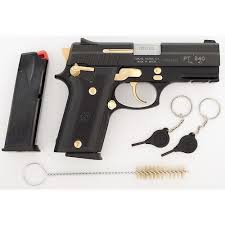 Taurus Pt 940 Semi Automatic Pistol With Gold Trim By