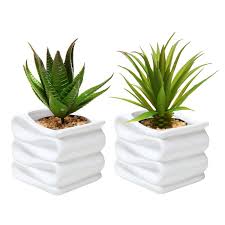 Get free shipping on qualified small, ceramic plant pots or buy online pick up in store today in the outdoors department. Designer Plant Pots Indoor