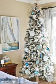 Christmas trees, wreaths, garlands, ornaments, tableware, lights, stockings, and other holiday accents can transform any space into a festive wonderland. 16 Chic Coastal Christmas Tree Ideas Sand And Sisal