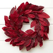 This elegant magnolia wreath incorporates large, realistic, artificial magnolia flowers and leaves on a grapevine oval base. Burgundy Artificial Magnolia Wreath Wreaths Floral Supplies Craft Supplies Factory Direct Craft