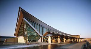 Beautiful view of Buffalo Niagara International Airport showcasing its modern terminal and busy tarmac.