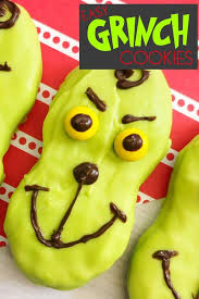 Theres nothing better than chocolate and peanut butter! How The Grinch Stole Christmas Nutter Butters Decorated Cookies