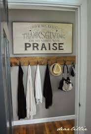 My auntie jessie made this custom coat hook rack for her guest room (see more of this n.b.: Dear Lillie Jason S Hallway Diy Coat Rack Rustic Coat Rack Decor