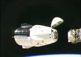 Crew dragon returns safely from the international space station dragon is seen against the earth's atmosphere Exploring Space For All Mankind Spacex S Cargo Dragon Flying Nasa S Dm 1 Mission