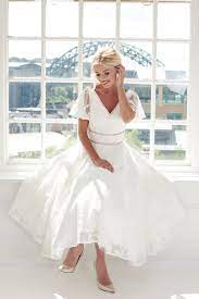 Whether you are a bride who likes lace, tulle, sparkle, or frills, the skirt of your dress should be comfortable yet stylish. 25 Short Wedding Dresses You Ll Love Confetti Co Uk