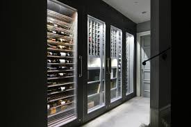 Vin De Garde Custom Modern Wine Fridge Vin De Garde Modern Wine Cellar Designs Archello Home Wine Cellars Wine Storage Wine Closet