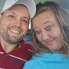 Admin approve asap Just came up under bridge by tap & barrel pub, small  black cat i think with blue collar running up side of traffic stopped and  turned tound and ran