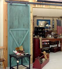These types of doors are easily identifiable, thanks to the use of a large wooden barn door, the top half divided into window panes. Image Result For Vintage Teal Reclaimed Wood Wood Barn Door Barn Door Barn Renovation