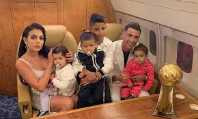 Birth dates, parentage, surnames and fun facts about portuguese footballer cristiano ronaldo, his 4 children and his girlfriend georgina rodriguez. Cristiano Ronaldo Poses With Another Trophy Alongside Girlfriend And Four Children Daily Mail Online