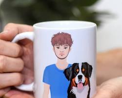 person holding a dog mugの画像