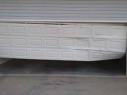 Local garage door company shelby township, mi. Broken Garage Door Spring Repair Spartanburg Greenville Sc