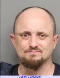 Armed Man Arrested Following Foot Chase