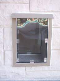 lone star dog doors in dallas tx area install a hale pet door in brick wall dog door pet door doggie door wall