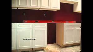 If the cabinet is low in the back, slide a wood shim between the wall and the back of the cabinet at the top of the cabinet. Leveling Base Cabinets Kitchen Remodeling Youtube