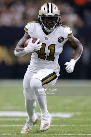 Alvin Kamara Of The New Orleans Saints Runs With The Ball During A Nfl Saints New Orleans Saints Football Saints Players