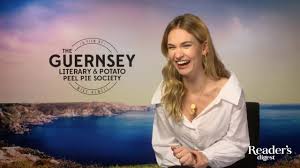 Juliet is more than intrigued. Lily James The Guernsey Literary And Potato Peel Pie Society Interview Youtube
