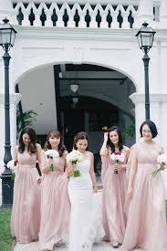 Bride And Bridesmaids In Pink Gowns Kane And Vicky S Travel Themed Garden Wedding At Tamarind Hill Singapore Wedding Brides And Bridesmaids Bridesmaid