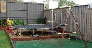 Trampoline Base Ideas For Backyard Backyard Trampoline Small Backyard Landscaping Small Backyard