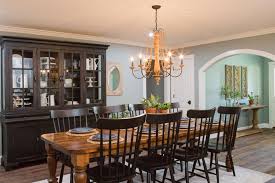 Discover rustic french country tables, painted farm tables, shabby chic pedestal tables, and industrial dining tables, many with trestle or pedestal bases. Simply Elegant Country Dining Room With Large Wood China Cabinet Long Dining Table And Beaded Chandelier Hgtv